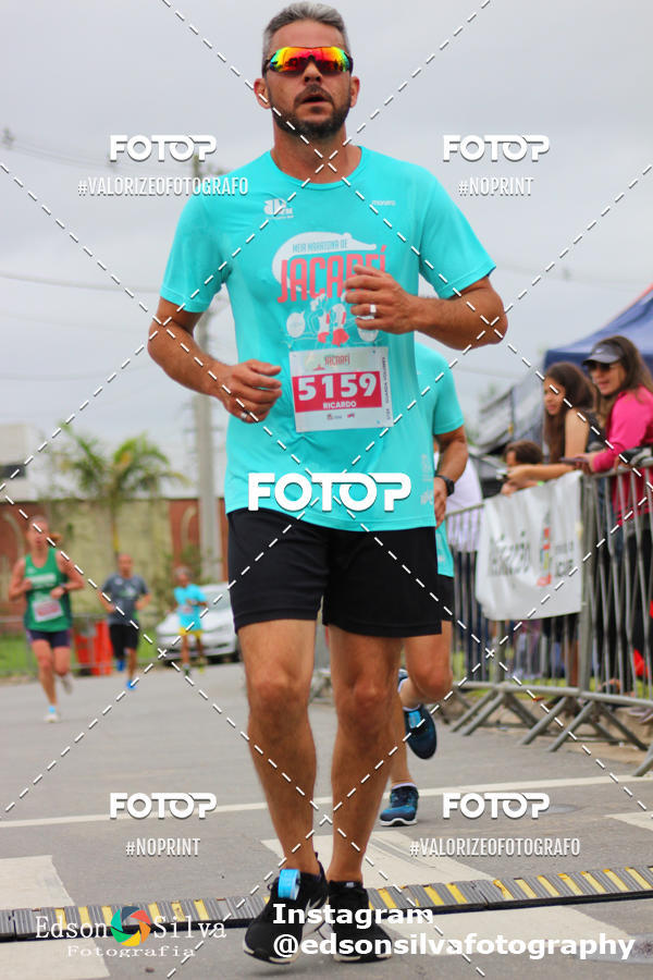 Buy your photos of the eventMEIA MARATONA DE JACARE  on Fotop