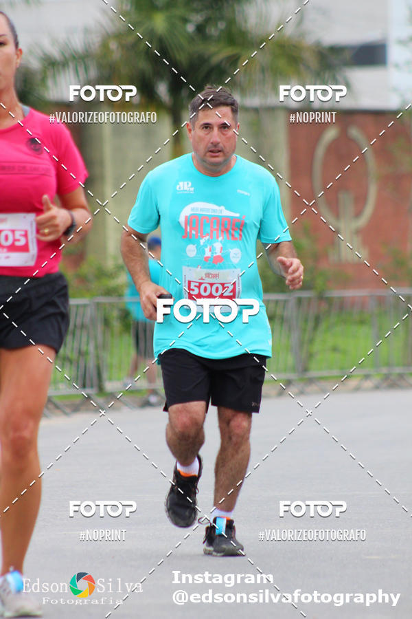 Buy your photos of the eventMEIA MARATONA DE JACARE  on Fotop