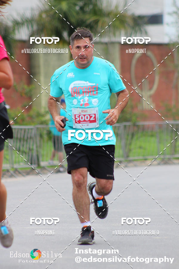 Buy your photos of the eventMEIA MARATONA DE JACARE  on Fotop