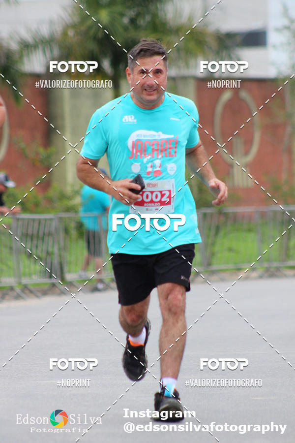 Buy your photos of the eventMEIA MARATONA DE JACARE  on Fotop