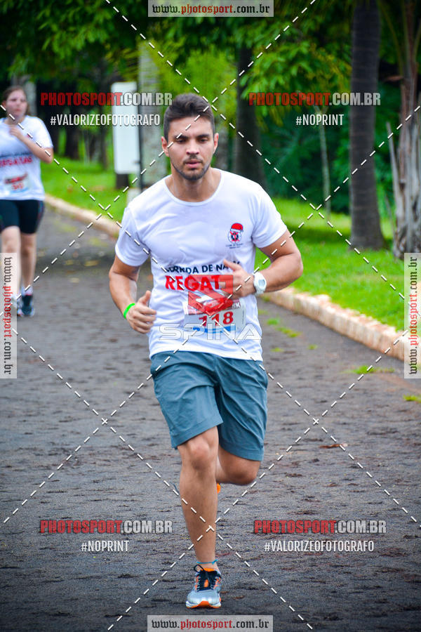 Buy your photos of the eventCorrida de Natal do Clube de Regatas on Fotop