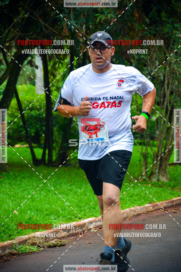 Buy your photos of the eventCorrida de Natal do Clube de Regatas on Fotop