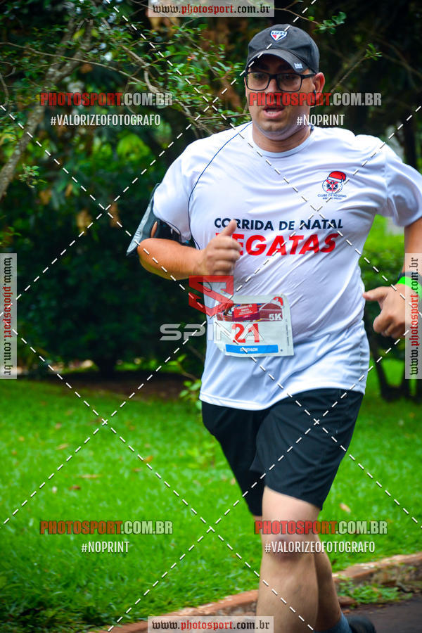 Buy your photos of the eventCorrida de Natal do Clube de Regatas on Fotop
