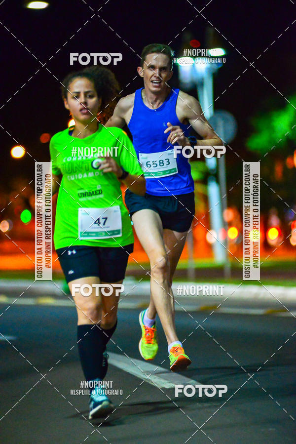 Buy your photos of the event5 Corrida Noturna Unimed Cascavel on Fotop