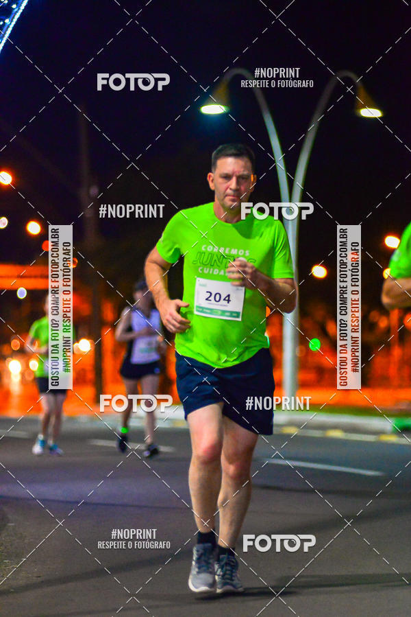 Buy your photos of the event5 Corrida Noturna Unimed Cascavel on Fotop