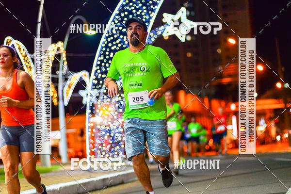 Buy your photos of the event5 Corrida Noturna Unimed Cascavel on Fotop