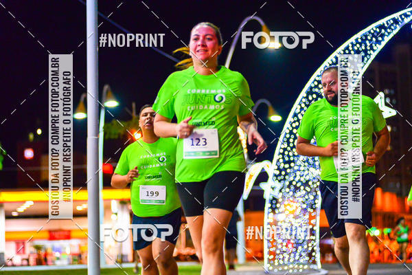 Buy your photos of the event5 Corrida Noturna Unimed Cascavel on Fotop