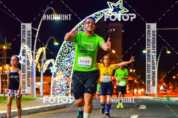 Buy your photos of the event5 Corrida Noturna Unimed Cascavel on Fotop