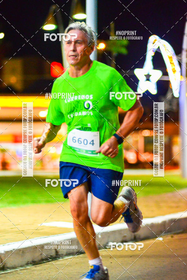 Buy your photos of the event5 Corrida Noturna Unimed Cascavel on Fotop