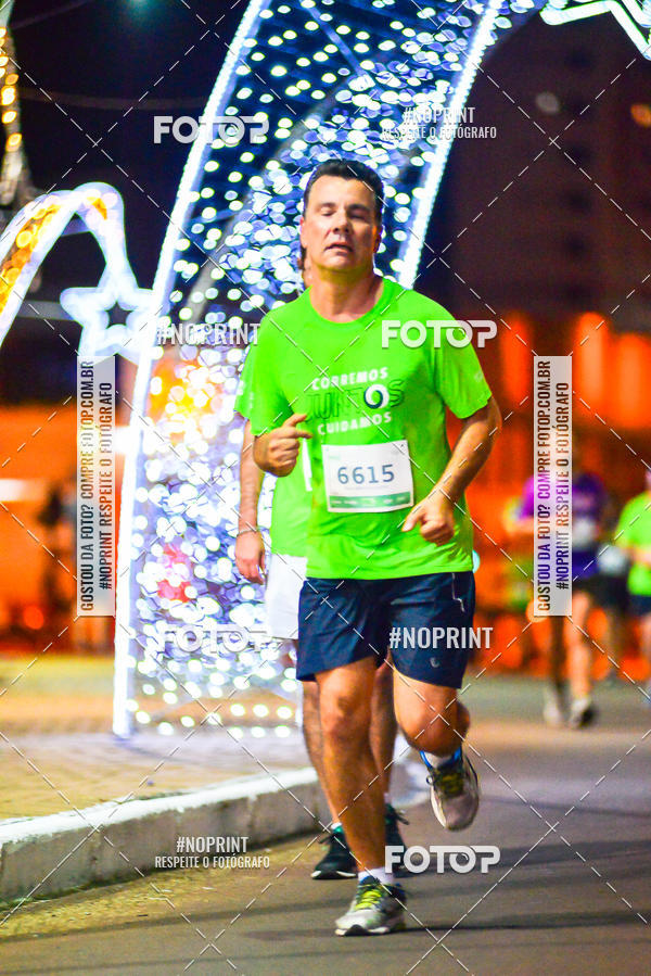 Buy your photos of the event5 Corrida Noturna Unimed Cascavel on Fotop