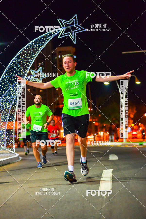 Buy your photos of the event5 Corrida Noturna Unimed Cascavel on Fotop