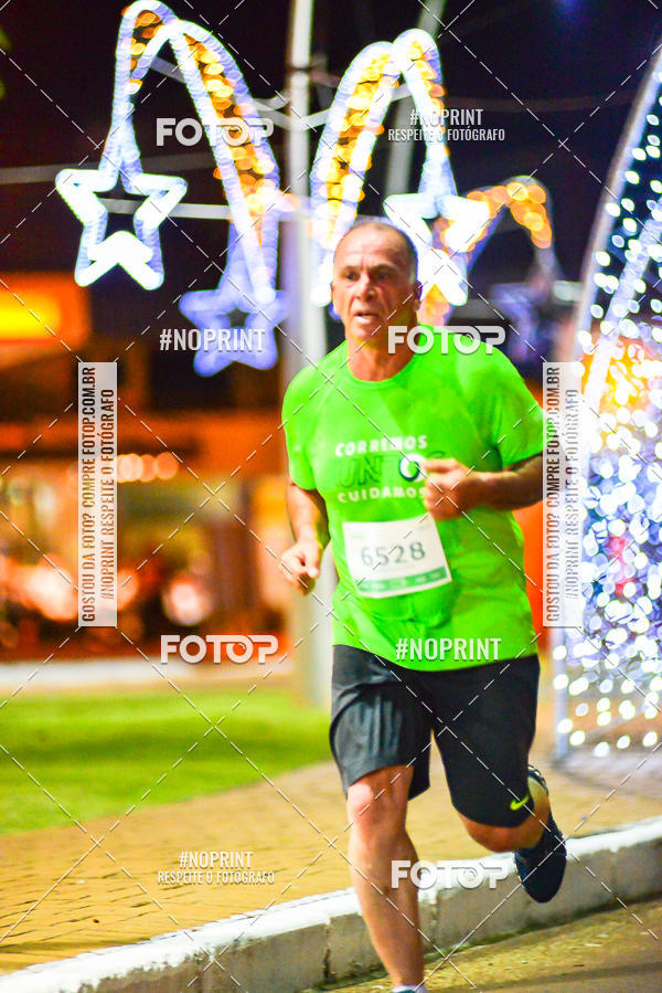 Buy your photos of the event5 Corrida Noturna Unimed Cascavel on Fotop