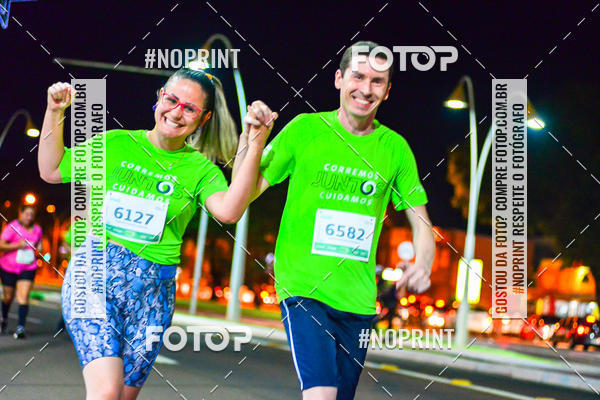 Buy your photos of the event5 Corrida Noturna Unimed Cascavel on Fotop