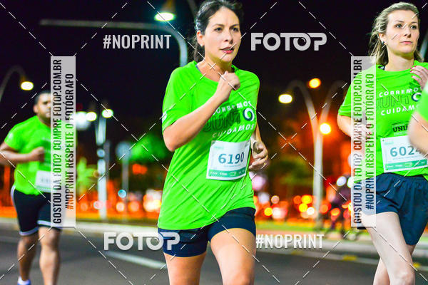 Buy your photos of the event5 Corrida Noturna Unimed Cascavel on Fotop