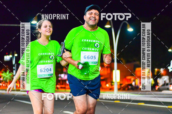 Buy your photos of the event5 Corrida Noturna Unimed Cascavel on Fotop