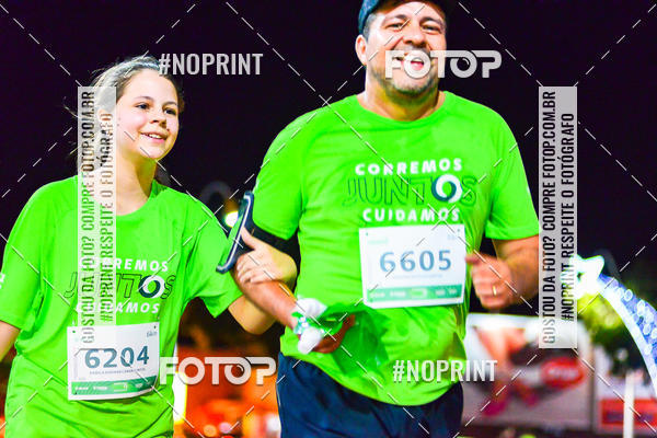 Buy your photos of the event5 Corrida Noturna Unimed Cascavel on Fotop