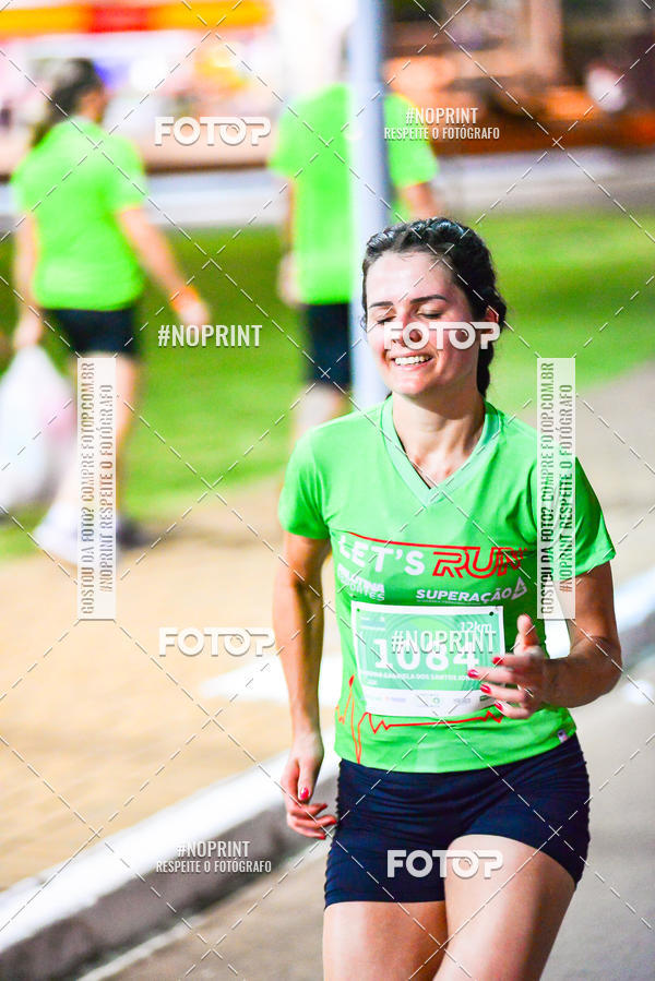 Buy your photos of the event5 Corrida Noturna Unimed Cascavel on Fotop