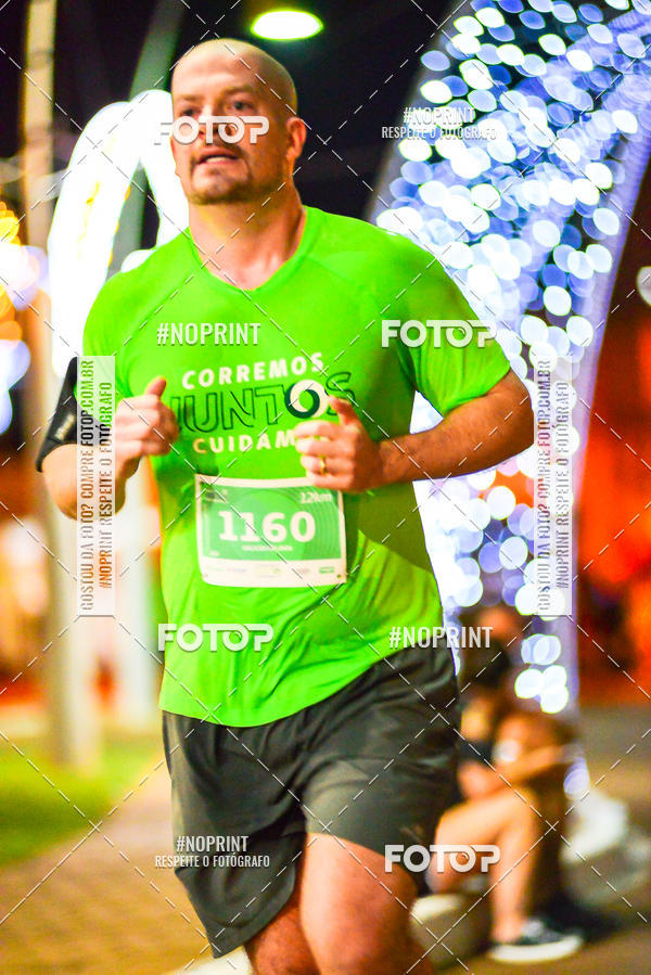 Buy your photos of the event5 Corrida Noturna Unimed Cascavel on Fotop