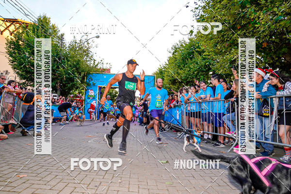 Buy your photos of the eventCorrida Iluminada de Natal 2019 on Fotop
