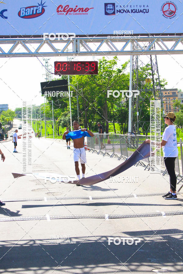 Compre suas fotos do eventoCorrida e Caminhada Azul no Fotop