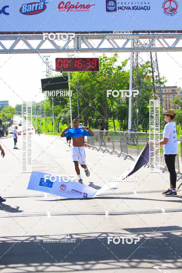 Compre suas fotos do eventoCorrida e Caminhada Azul no Fotop