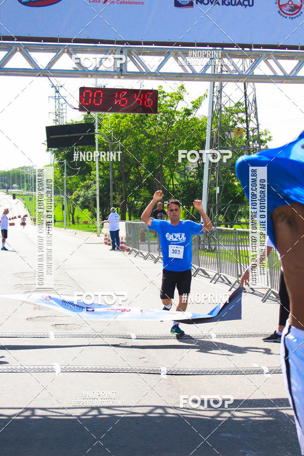 Compre suas fotos do eventoCorrida e Caminhada Azul no Fotop