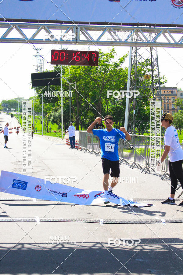 Compre suas fotos do eventoCorrida e Caminhada Azul no Fotop