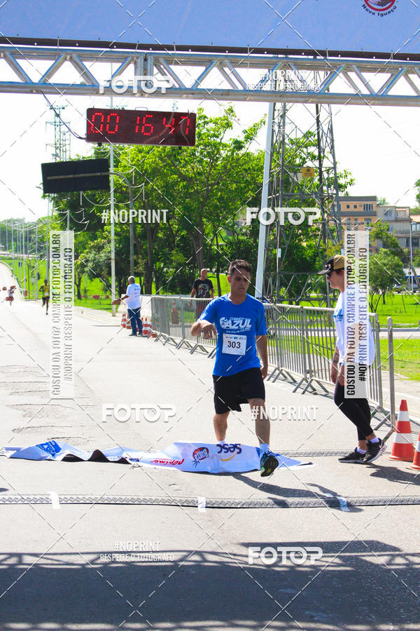 Compre suas fotos do eventoCorrida e Caminhada Azul no Fotop