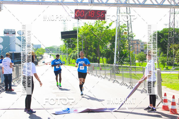 Compre suas fotos do eventoCorrida e Caminhada Azul no Fotop