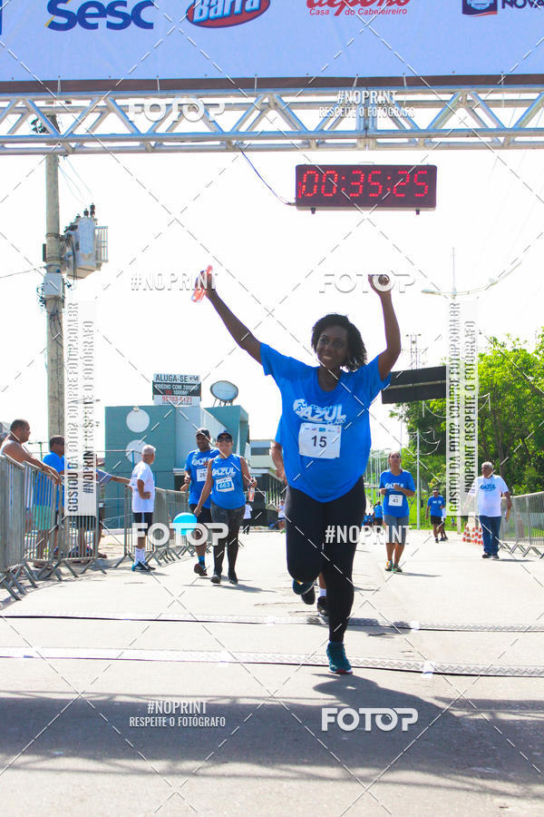 Compre as suas fotos do eventoCorrida e Caminhada Azul no Fotop