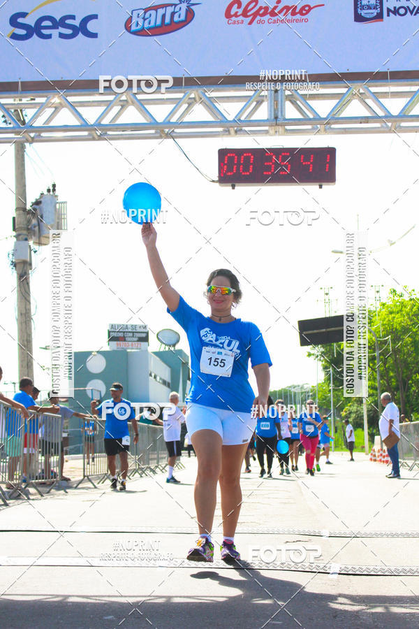 Compre as suas fotos do eventoCorrida e Caminhada Azul no Fotop