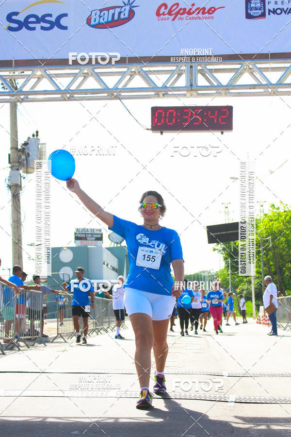 Compre as suas fotos do eventoCorrida e Caminhada Azul no Fotop