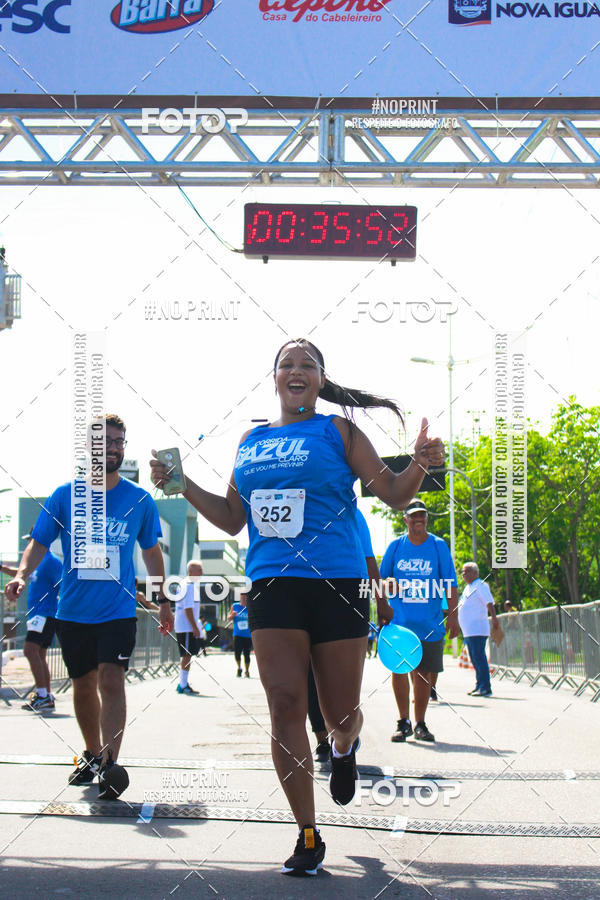 Compre as suas fotos do eventoCorrida e Caminhada Azul no Fotop