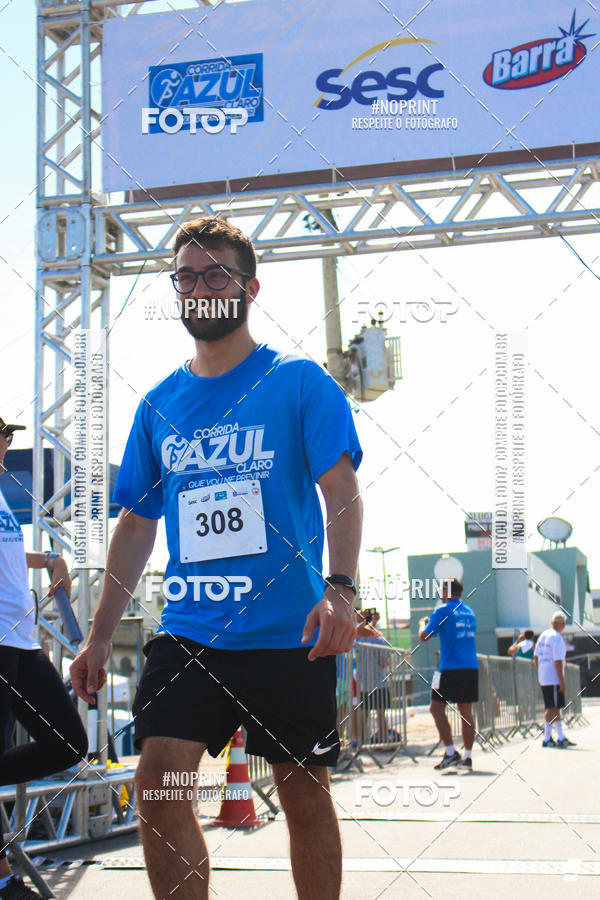 Compre as suas fotos do eventoCorrida e Caminhada Azul no Fotop