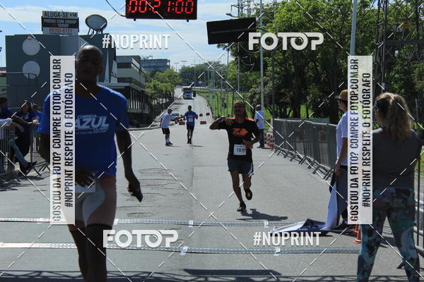 Compre as suas fotos do eventoCorrida e Caminhada Azul no Fotop