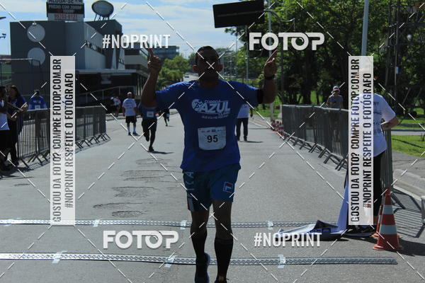 Compre as suas fotos do eventoCorrida e Caminhada Azul no Fotop