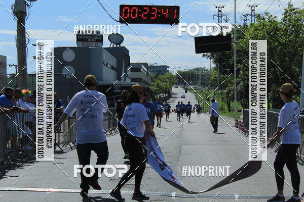 Compre as suas fotos do eventoCorrida e Caminhada Azul no Fotop