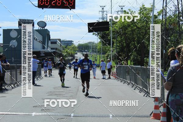 Compre as suas fotos do eventoCorrida e Caminhada Azul no Fotop