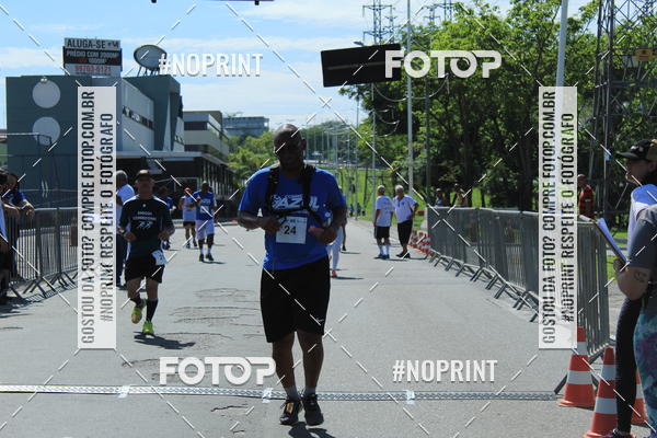 Compre as suas fotos do eventoCorrida e Caminhada Azul no Fotop