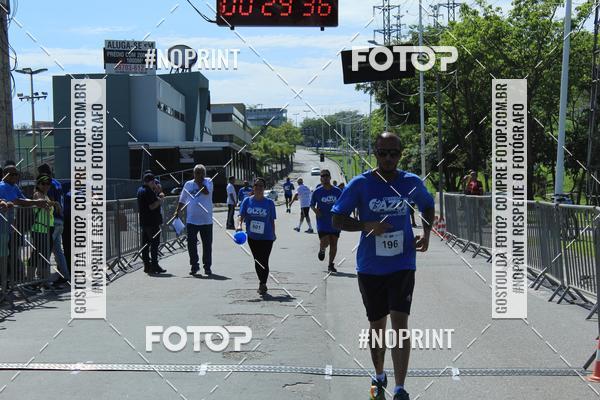 Compre as suas fotos do eventoCorrida e Caminhada Azul no Fotop