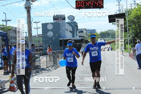 Buy your photos of the eventCorrida e Caminhada Azul on Fotop