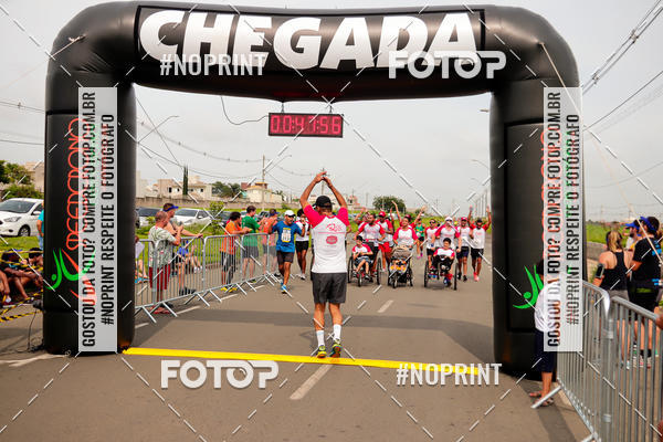 Buy your photos of the event4 Corrida Solidria - 6K Corrida e 4K Caminhada on Fotop