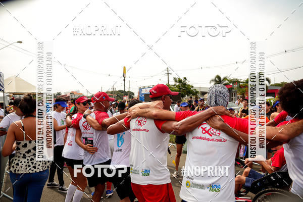Buy your photos of the event4 Corrida Solidria - 6K Corrida e 4K Caminhada on Fotop