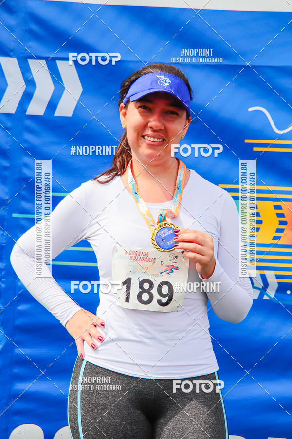 Buy your photos of the event4 Corrida Solidria - 6K Corrida e 4K Caminhada on Fotop