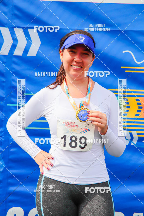 Buy your photos of the event4 Corrida Solidria - 6K Corrida e 4K Caminhada on Fotop