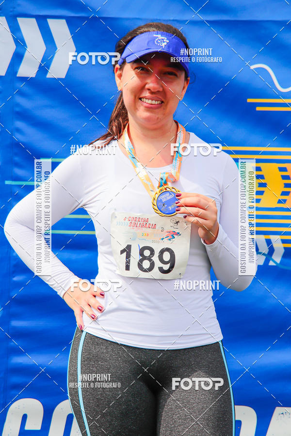 Buy your photos of the event4 Corrida Solidria - 6K Corrida e 4K Caminhada on Fotop