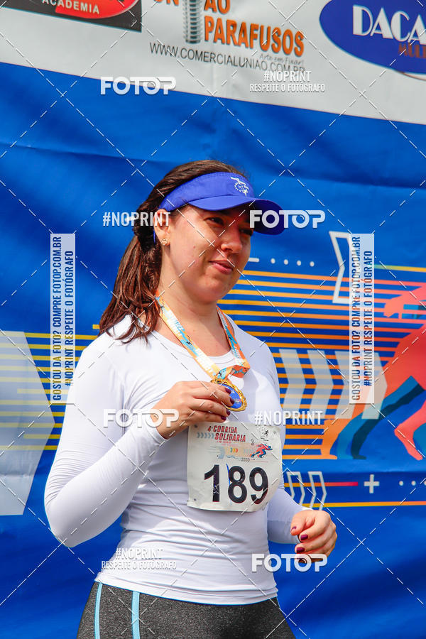 Buy your photos of the event4 Corrida Solidria - 6K Corrida e 4K Caminhada on Fotop