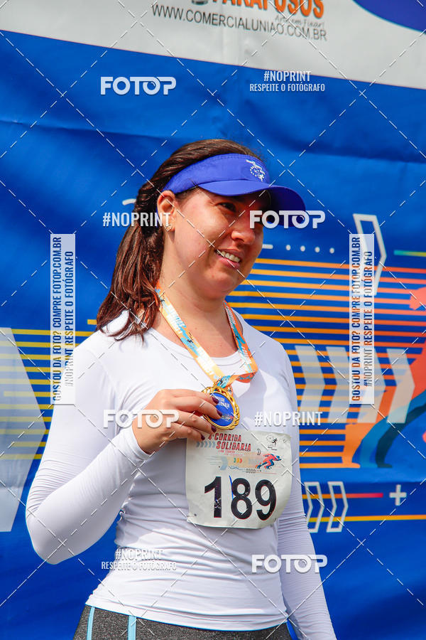 Buy your photos of the event4 Corrida Solidria - 6K Corrida e 4K Caminhada on Fotop