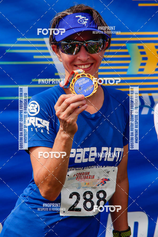 Buy your photos of the event4 Corrida Solidria - 6K Corrida e 4K Caminhada on Fotop