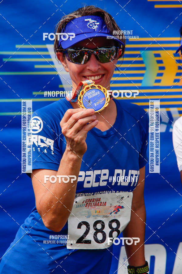 Buy your photos of the event4 Corrida Solidria - 6K Corrida e 4K Caminhada on Fotop